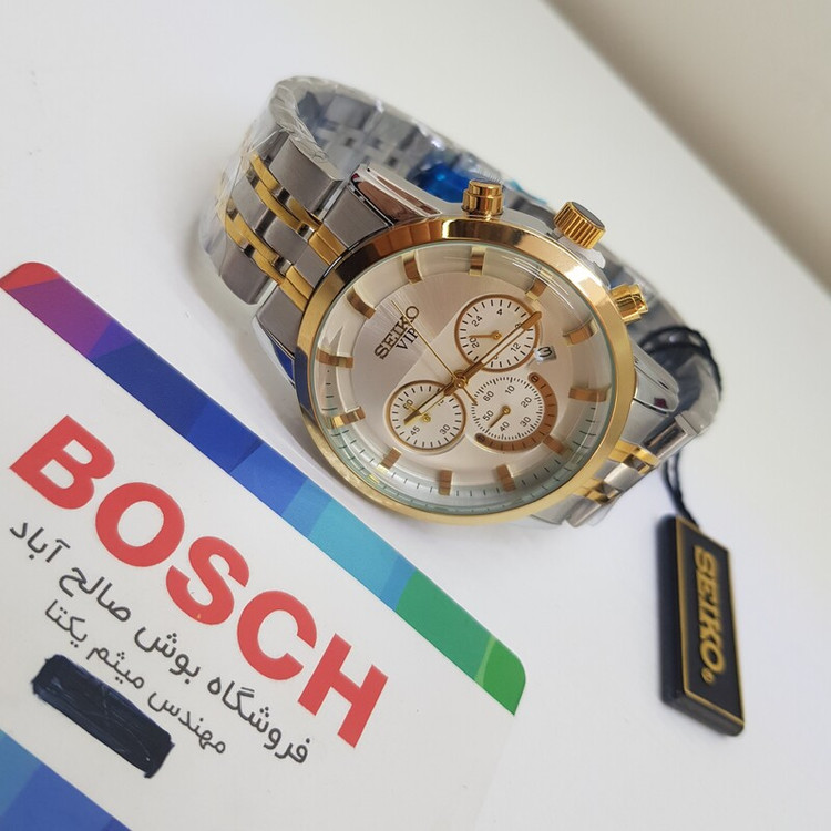 ساعت مچی سیکو ژاپن طلایی نقره ای مردانه به همراه جعبه و باری اضافه 2363 G